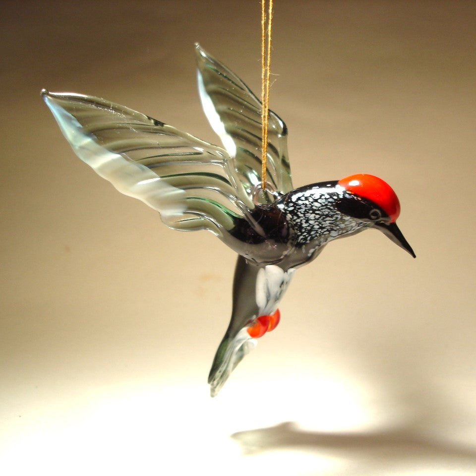 Glass woodpecker figurine ornament with red head and grey wings