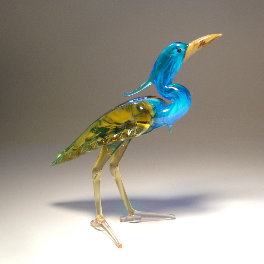 Front view of a glass blue neck heron figurine, showcasing its elegant stance and long, graceful neck.