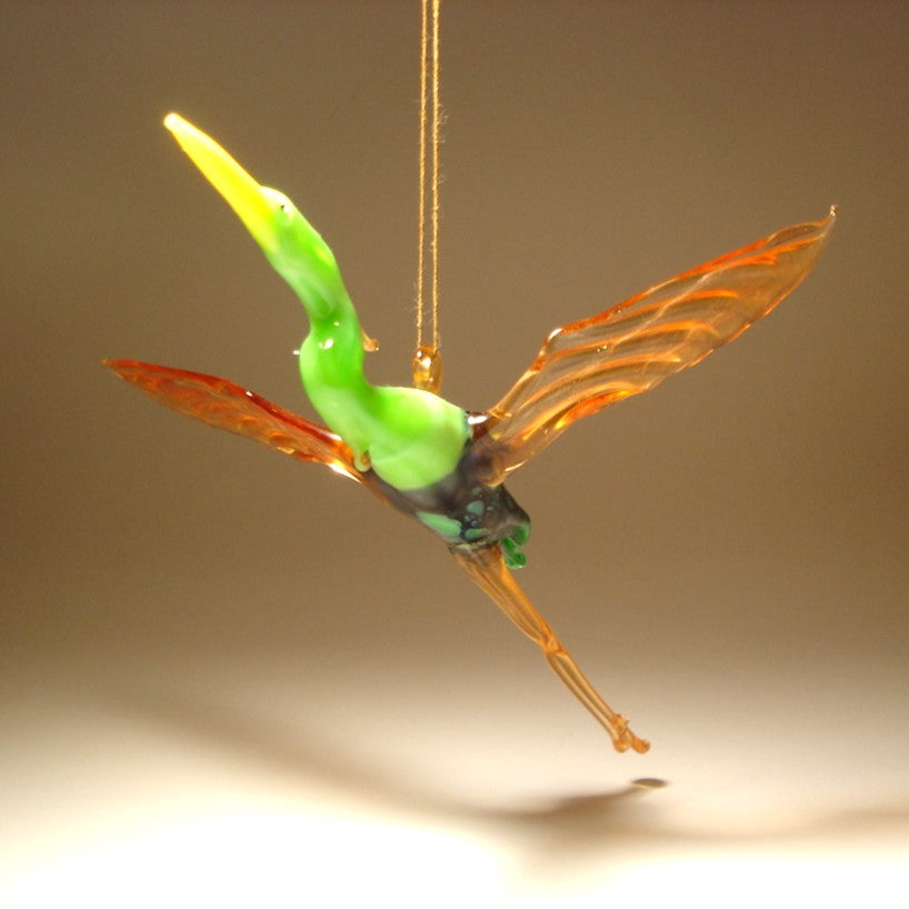 Close-up of the Glass Heron in Flight Hanging Figurine Ornament, capturing the heron's outstretched wings and detailed feathers as it soars.