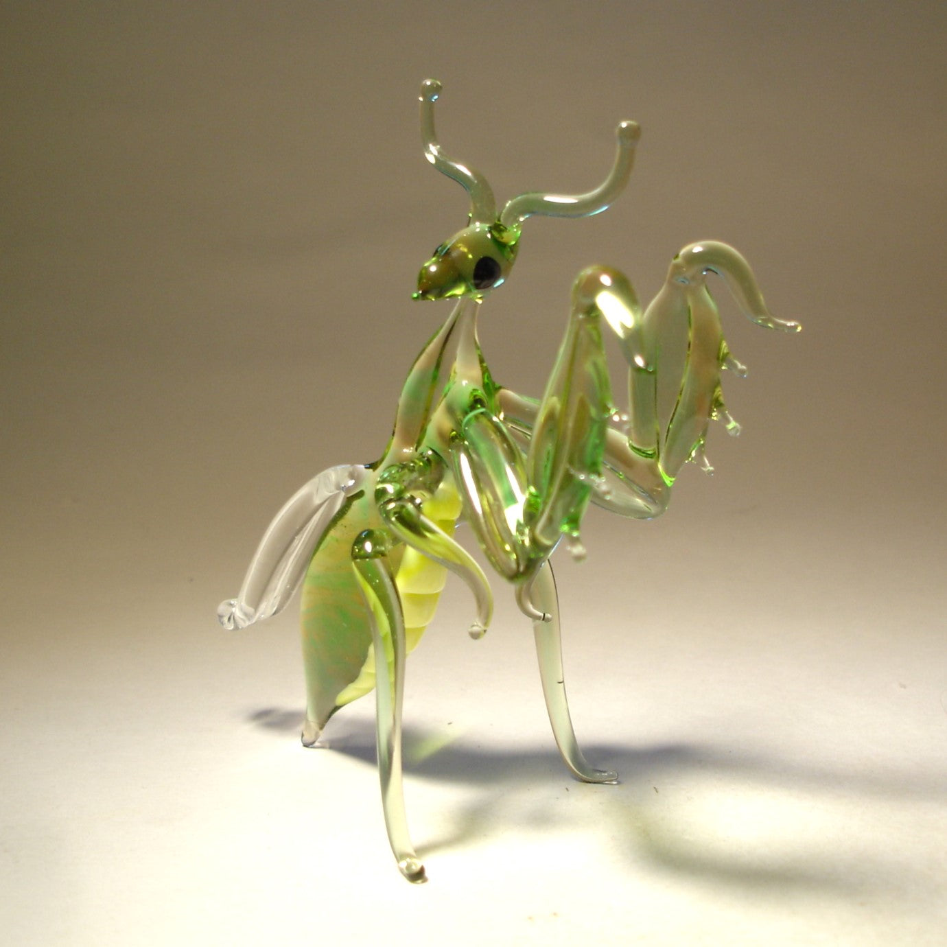 Glass Mantis figurine in light green