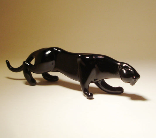Handmade glass panther figurine featuring sleek details and elegant craftsmanship