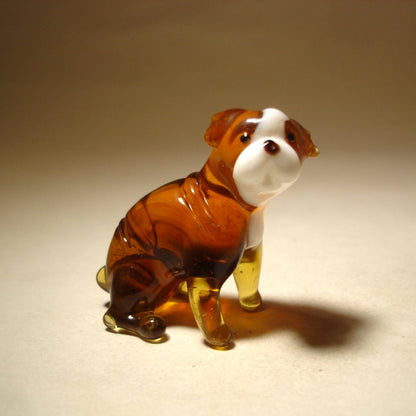 Close-up of the glass English Bulldog figurine, highlighting the intricate craftsmanship of its folded ears and robust body, perfectly capturing the breed's unique features.