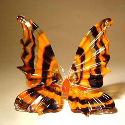 Handmade orange and black striped glass butterfly