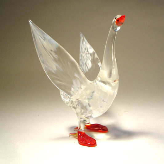 Glass Goose figurine made with clear and white glass flapping it's wings