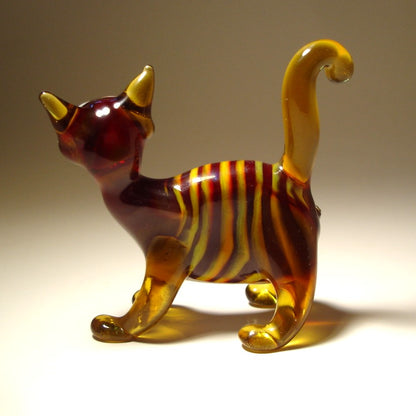 a back view of the striped brown cat figurine