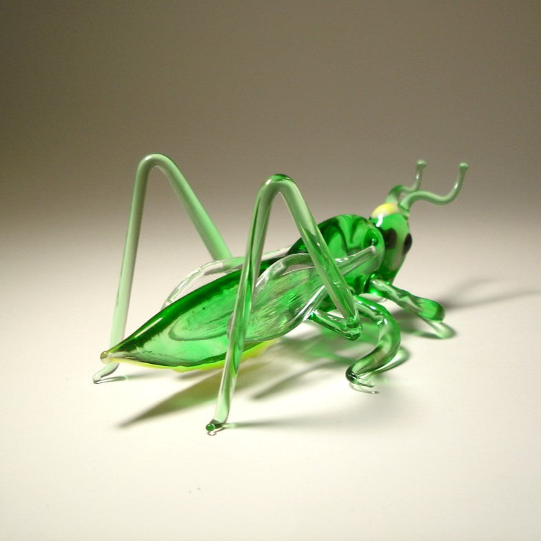 Green glass insect sculpture 