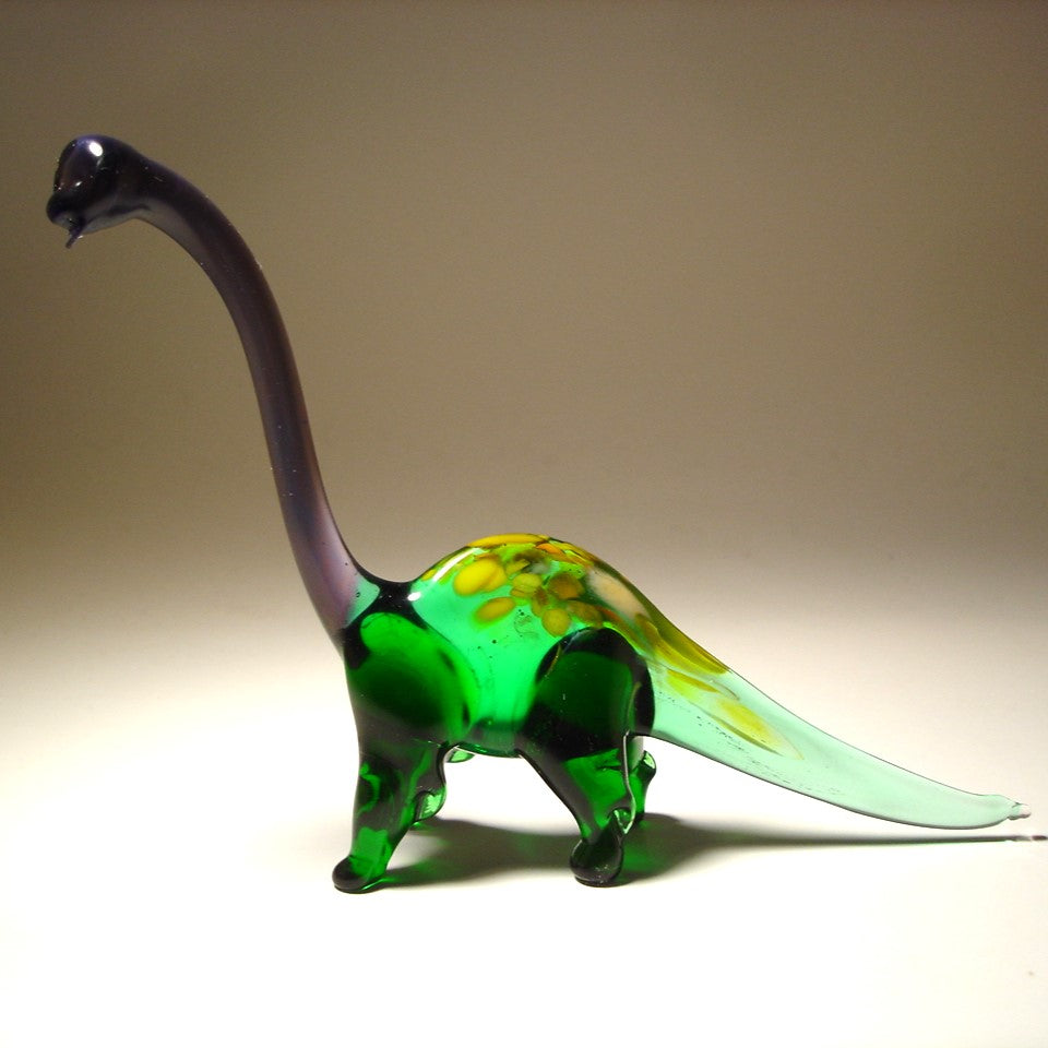 Side view of the glass Brachiosaurus figurine, highlighting its detailed body and towering neck