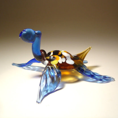 side view of the handmade blue glass turtle