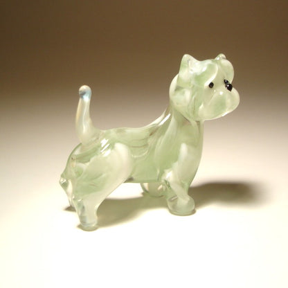 A handcrafted standing glass West Highland Terrier figurine in clear glass.