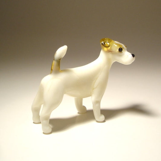 Side view of the glass Jack Russell Terrier figurine, highlighting its alert expression, high set tail, and detailed fur texture.