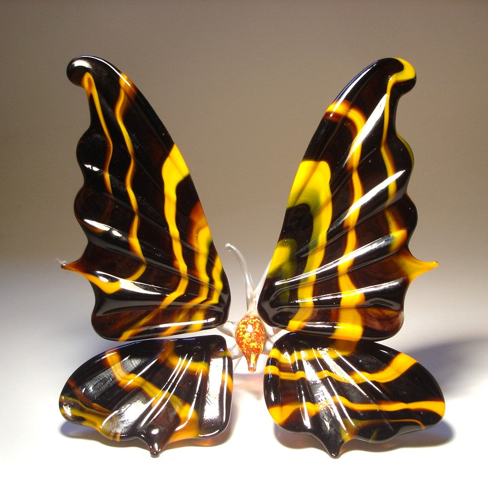 Handmade black and orange striped glass butterfly