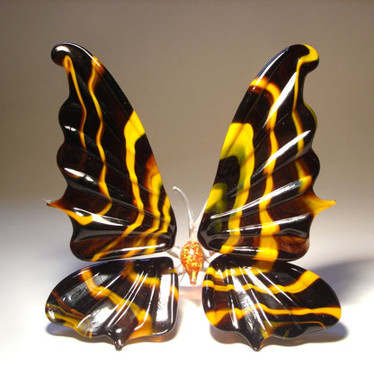 Handmade black and orange striped glass butterfly
