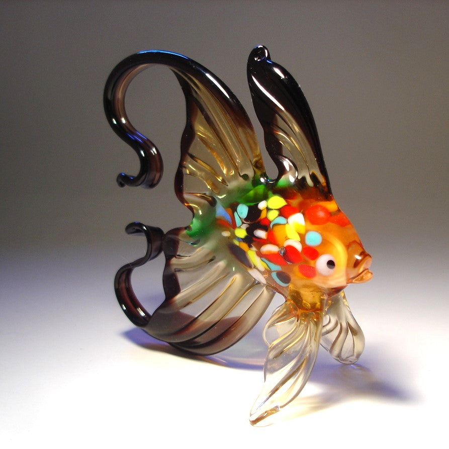 Glass fish sculpture with multicolored body 
