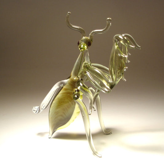 Handmade glass mantis figurine in light gray-green color with yellow belly