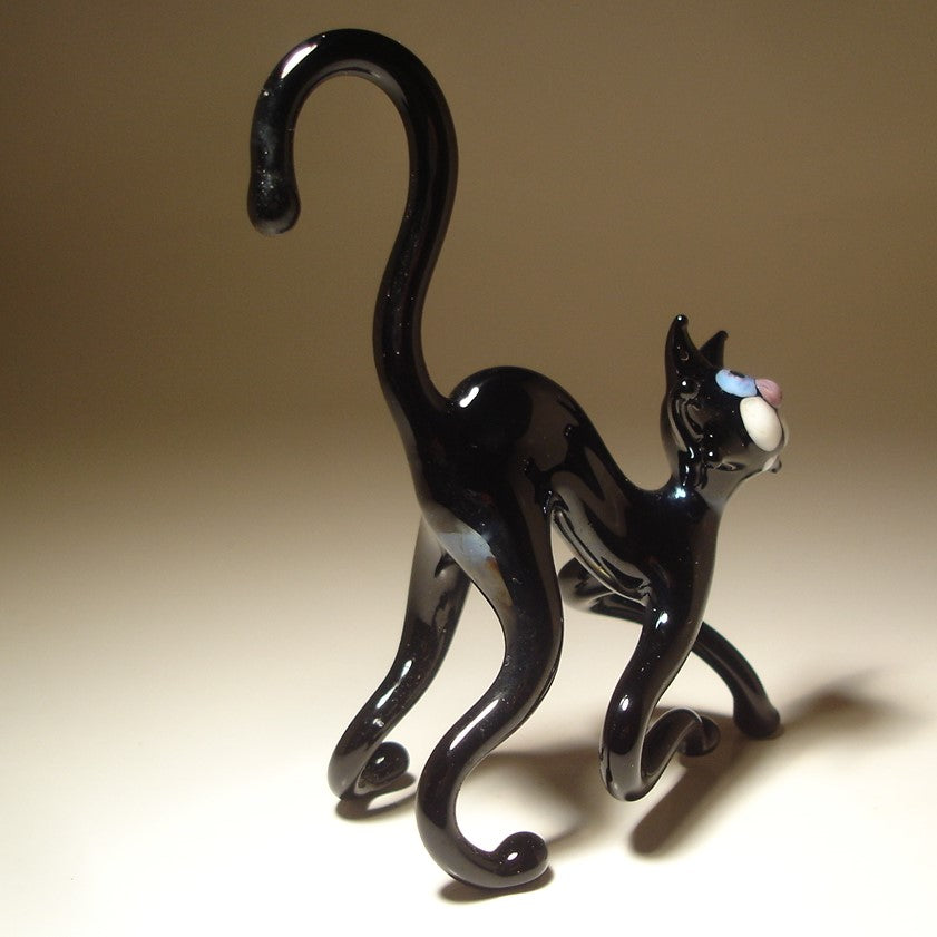 Glass cat figurine from behind