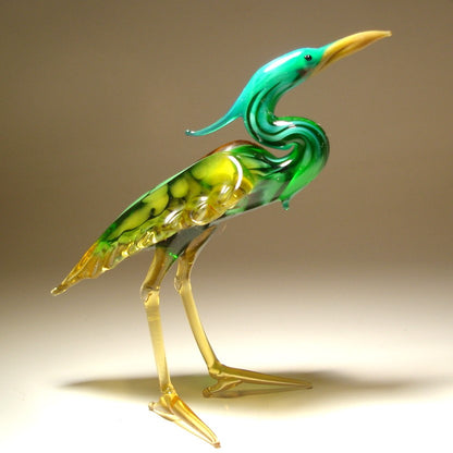 Another view of a glass blue neck heron figurine, showcasing its elegant stance and long, graceful neck.