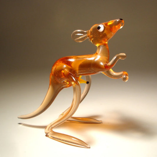 A close-up shot of the glass kangaroo and baby figurine, focusing on the delicate details of the joey peeking from the pouch