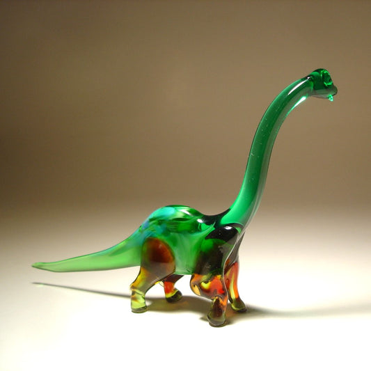 Front view of a glass Brachiosaurus figurine, showcasing its long neck and graceful stance.