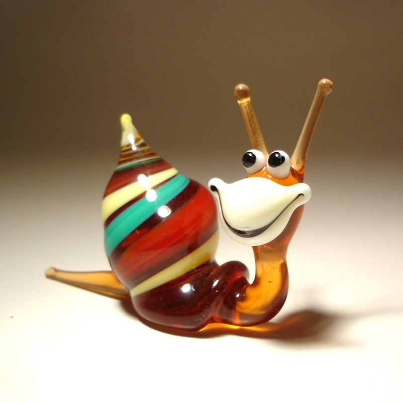 Handmade glass happy snail figurine - Blue, red and Orange shell, white face and a smile.
