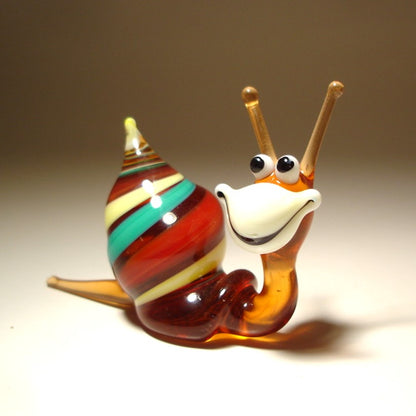 Handmade glass happy snail figurine - Blue, red and Orange shell, white face and a smile.