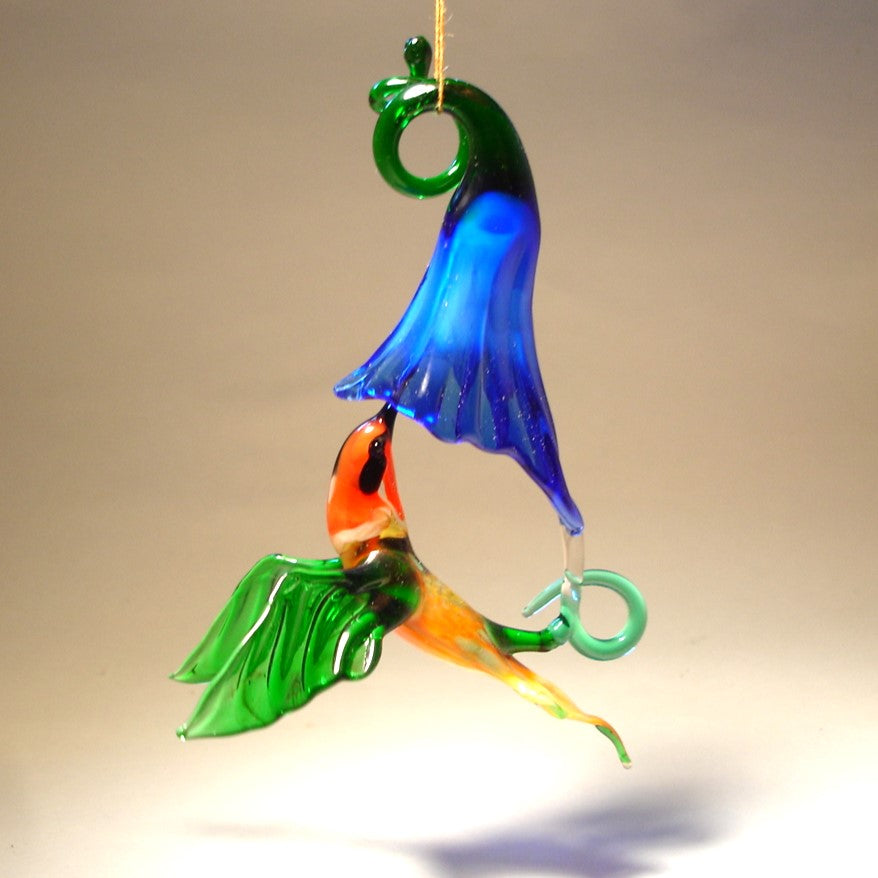 Handmade hummingbird and blue flower ornament