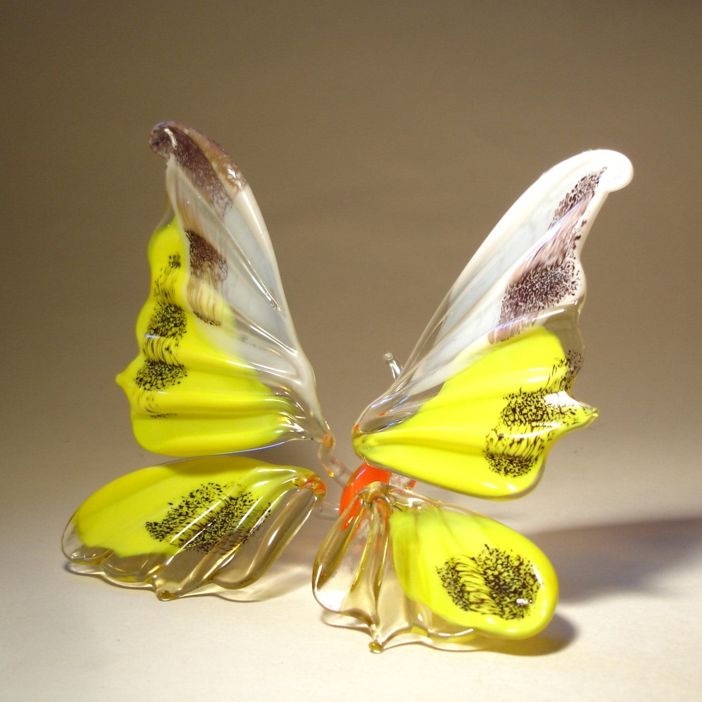 Glass butterfly with orange body