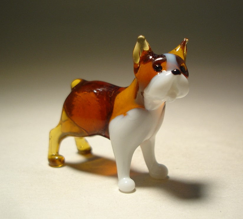 Hadcrafted glass Boston Terrier figurine featuring its distinctive short muzzle and large expressive eyes.