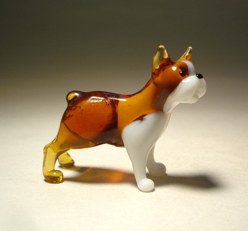 Side view of the glass Boston Terrier figurine, showcasing its compact body and characteristic upright ears.