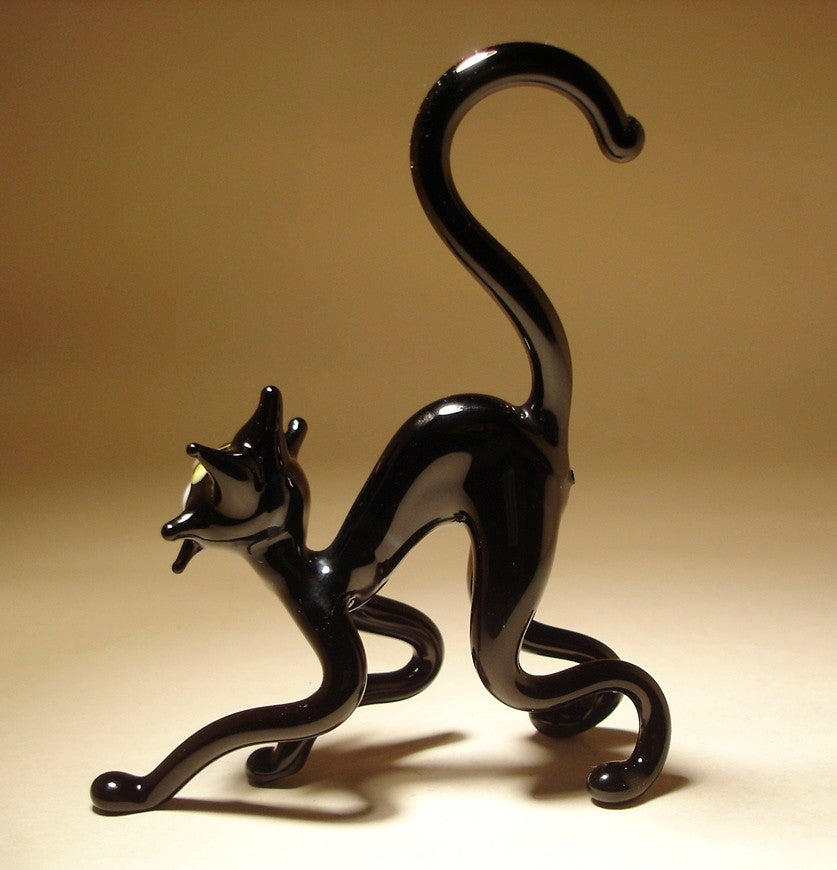 handmade black glass cat figurine, highlighting its arched back - another side view