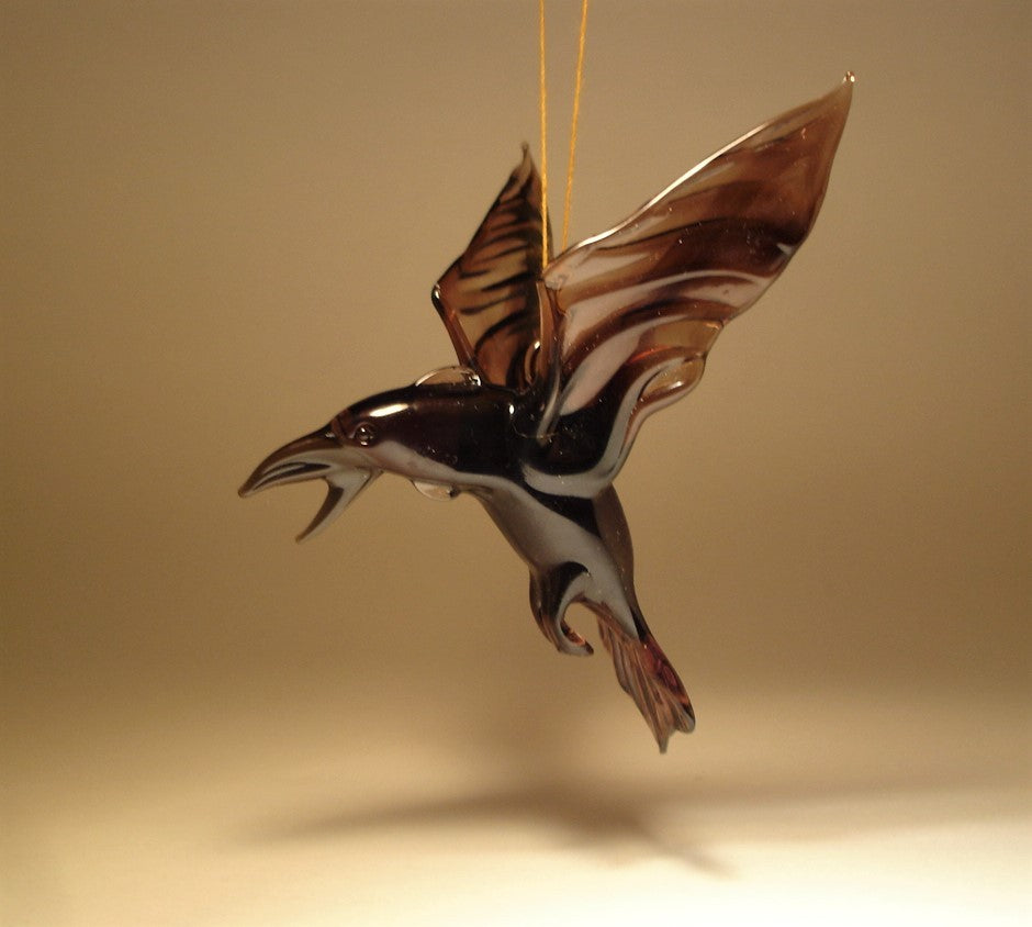 Side view of the glass raven crow figurine, focusing on the open beak and the fine craftsmanship of its wings and tail feathers.