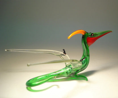 Close-up of the glass Pterodactyl figurine, showcasing the intricate wing patterns and smooth glass finish.