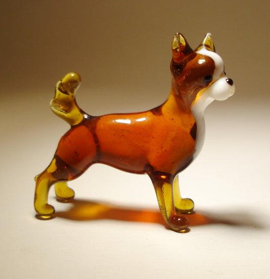 Charming glass Chihuahua figurine in a standing pose, capturing the breed’s alert expression.