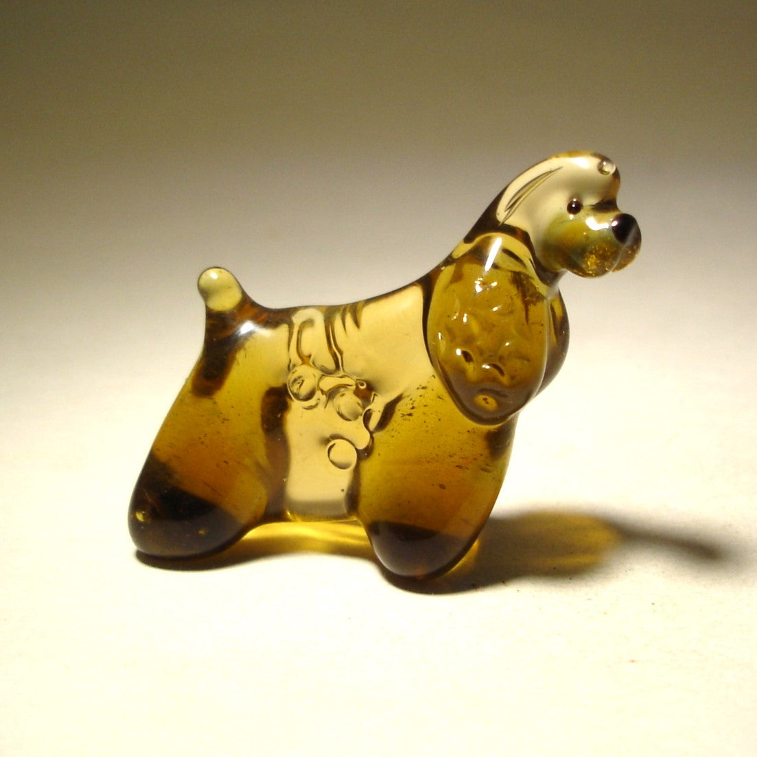 Handcrafted glass Cocker Spaniel figurine in a standing pose, featuring the breed’s iconic long, flowing ears and smooth coat.