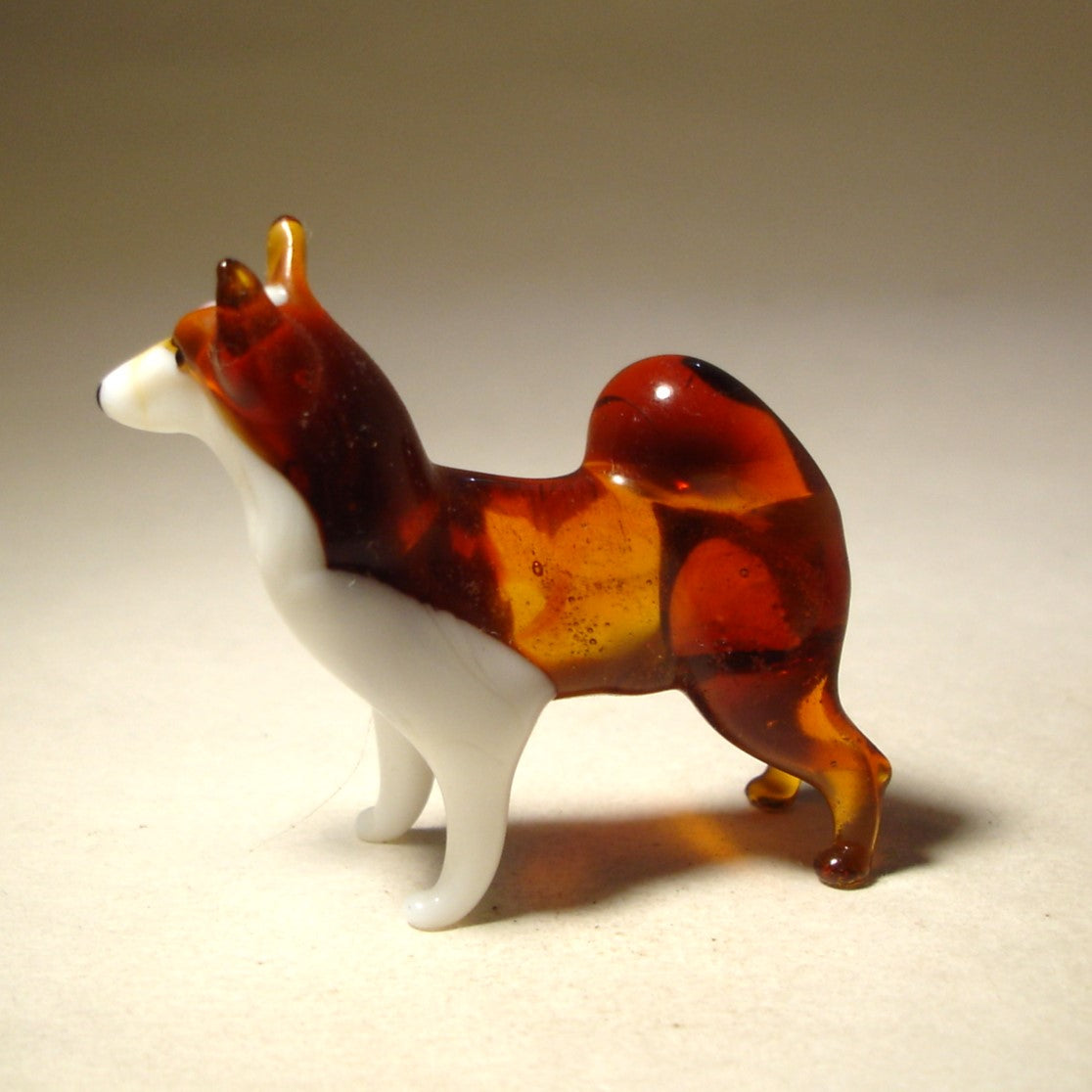 Glass brown and white dog Husky figurine standing.