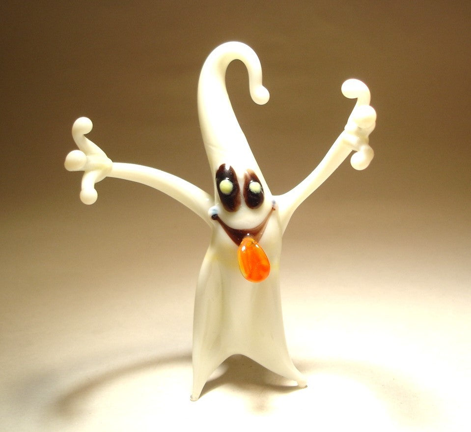 A comical glass white ghost figurine with flowing edges, appearing to float in mid-air.