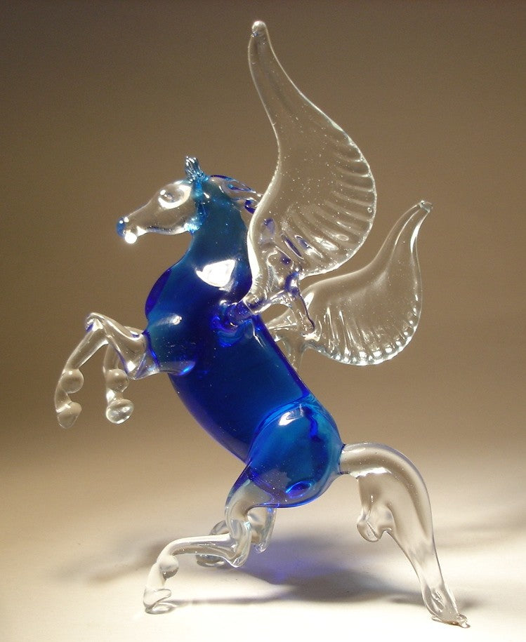 glass blue pegasus facing the opposite side