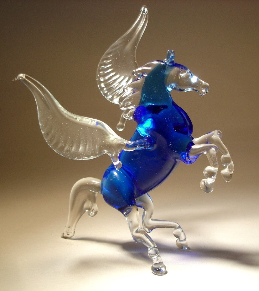 blue glass Pegasus figurine rearing with clear wings up 