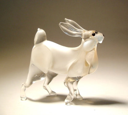 Handmade glass white rabbit figurine with clear glass ears, tail and legs.