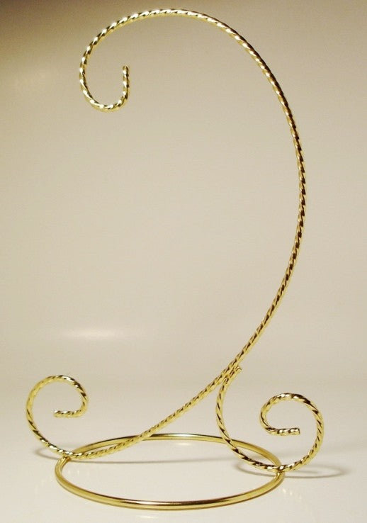 A brass stand for glass ornaments elegantly curved, with one hook.